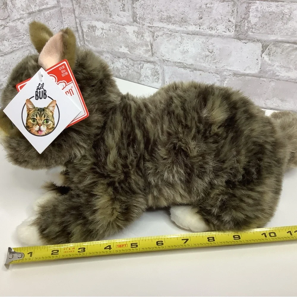 Brown and White Plush Cat Toy with Expressive Features